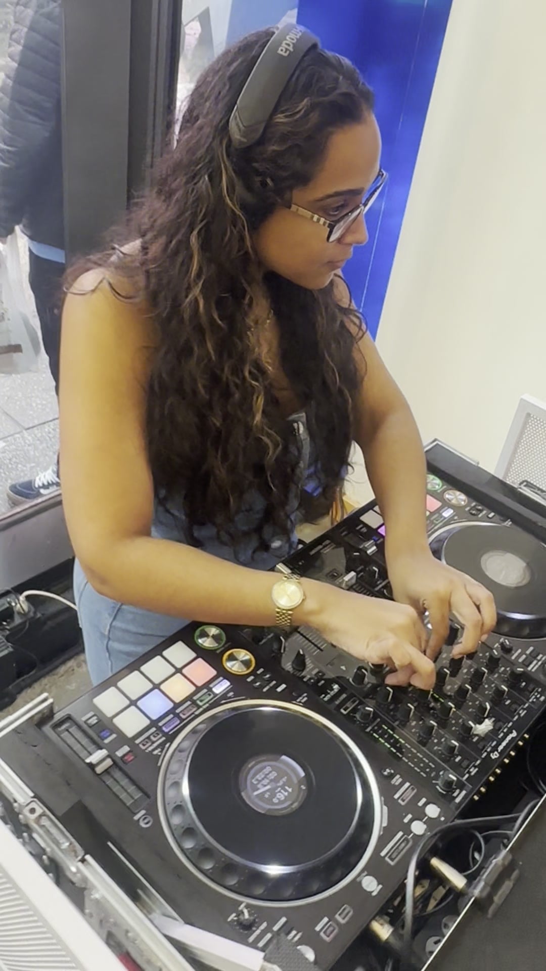 Close-up of La Phiesa working the CDJs and mixer during the Cinco de Mayo set at the Levi's Times Square store