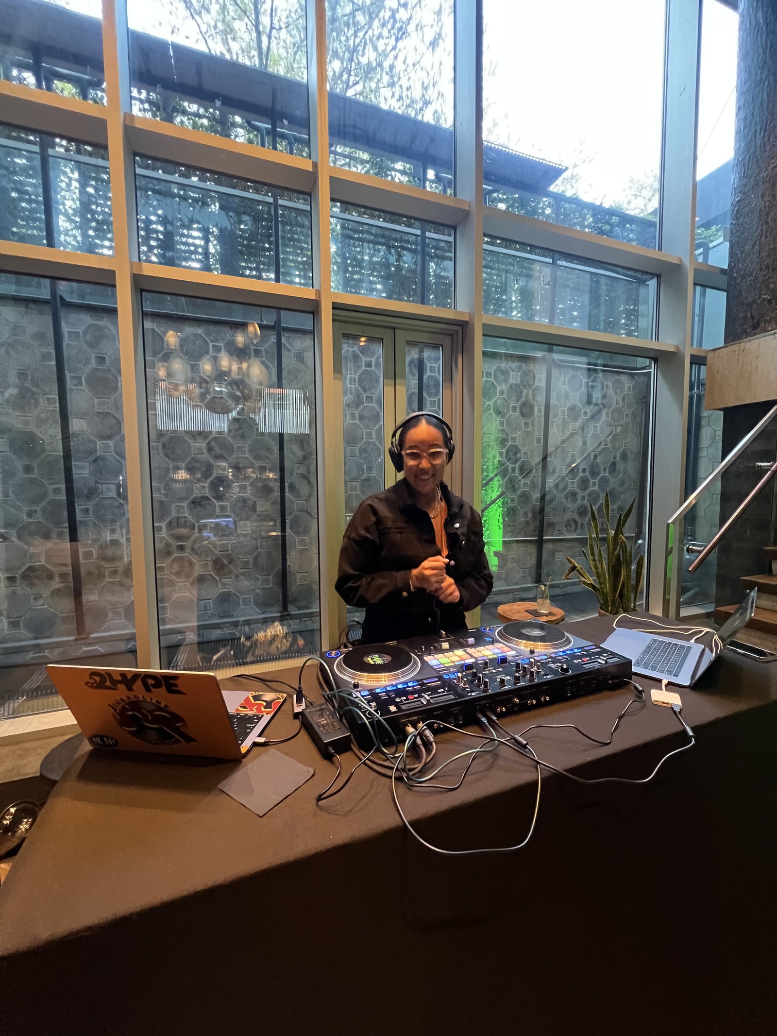 La Phiesa's DJ booth set up by the window at Coda Williamsburg